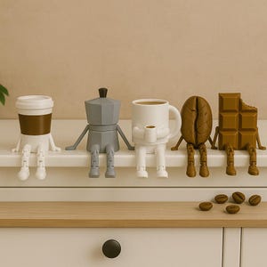 May include: A collection of whimsical coffee-themed figurines, including a to-go cup, a stovetop espresso maker, a coffee mug, a coffee bean, and a chocolate bar. Each figure has arms and legs, and they are sitting on a white surface. Several coffee beans are scattered below.