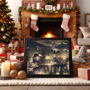 May include: A black framed paper cut art piece depicting a train traveling through a mountain landscape at night. The train is illuminated with warm yellow lights, and the moon is visible in the sky.