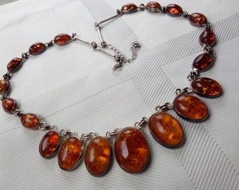 Vintage Spectacular Genuine Amber Beaded Necklace in an Amazing Bib design. Hallmarked on clasp "925". Adjustable from 17.5" inches to 20".