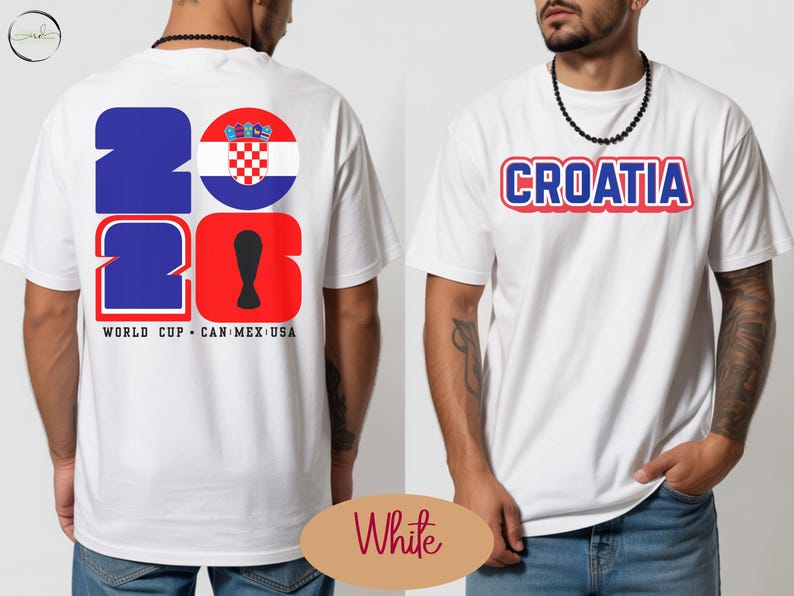 May include: White t-shirt with the word "CROATIA" in red and blue lettering. The back of the shirt features the numbers "2026" in blue and red, with a Croatian flag graphic and the text "WORLD CUP CAN MEX USA".