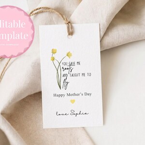 May include: A white Mother's Day gift tag with a floral illustration and the text "You gave me roots and taught me to fly." The tag includes the text "Happy Mother's Day" and "love Sophia."