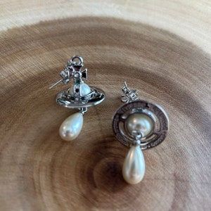 White Gold Pearl Saturn Earrings