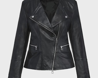 May include: A black leather jacket with a classic asymmetrical zipper closure. The jacket features silver zippers on the pockets and sleeves, and a notched collar. The jacket is a staple for any wardrobe.