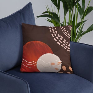 Sofa Cushion/Pillow in brown and burnt orange with a patterned effect