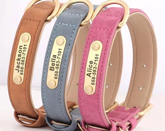 May include: Three leather dog collars in brown, blue, and pink with gold metal buckles and personalized name tags. Each tag has a name and phone number.