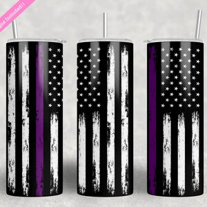May include: Three stainless steel tumblers with a distressed American flag design and a purple stripe down the center. The tumblers have lids and straws.