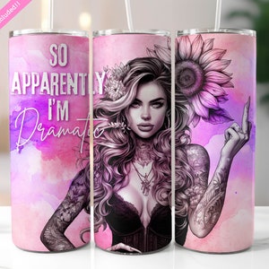 May include: A pink and purple watercolour background with a woman with tattoos and a sunflower behind her. The text "So Apparently I'm Dramatic" is on the left side of the image.