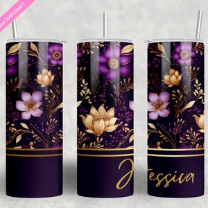 May include: A purple and gold floral design on a stainless steel tumbler. The tumbler has a gold band around the middle and the name "Jessiva" is written in gold on the bottom.