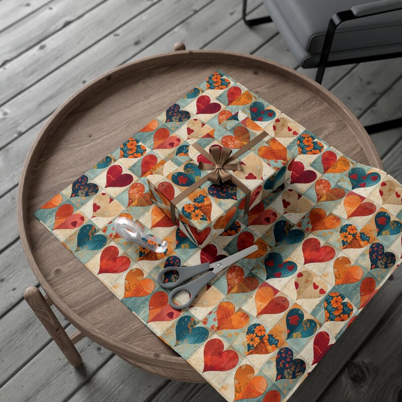 May include: A gift wrapped in colorful patchwork paper with a heart pattern. The paper is beige with red, orange, blue, and green hearts. The gift is tied with a brown ribbon and bow.