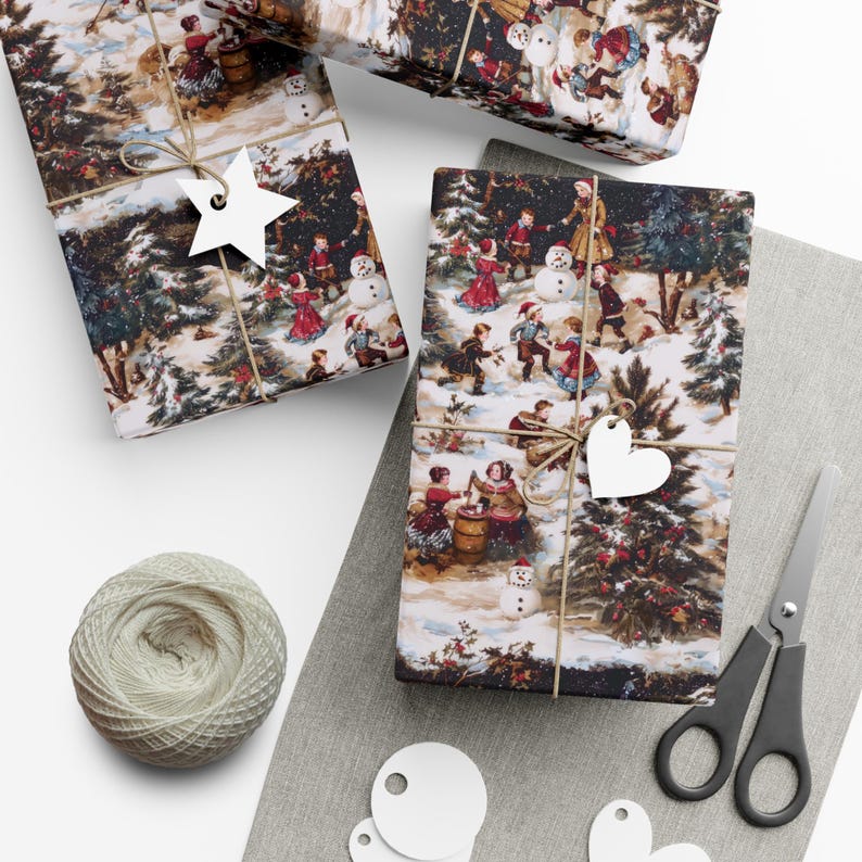 May include: Wrapped gifts with a vintage winter scene print featuring children, snowmen, and trees. Each package is tied with twine and a white tag. A ball of twine, scissors, and blank tags are also present.