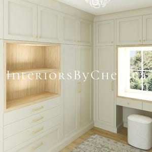 Puede incluir: Un sistema de armario empotrado a medida en acabado crema claro con puertas estilo shaker, herrajes dorados, una estanter&iacute;a de madera clara, cuatro cajones y un &aacute;rea de tocador integrada con ventana y un taburete blanco tapizado.