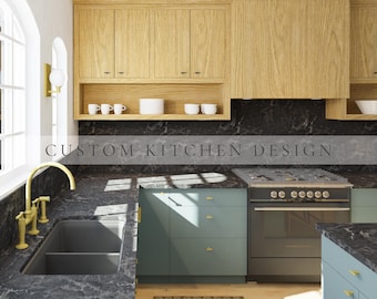 Puede incluir: Una cocina con armarios superiores de roble claro, armarios inferiores verde salvia y encimeras de mármol negro. Un grifo dorado se sitúa junto a un fregadero doble y una cocina de gas negra. El texto CUSTOM KITCHEN DESIGN está superpuesto.
