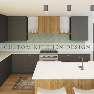 May include: A kitchen interior featuring dark gray cabinetry, a light wood range hood, and white countertops. A light green tiled backsplash sits behind a stainless steel gas range. The text CUSTOM KITCHEN DESIGN is centered over the image.