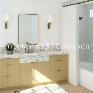 May include: A modern bathroom design featuring a light wood vanity with a marble countertop and a rectangular mirror. The vanity has gold hardware and a built-in sink. The shower area has a white curtain and a gold shower head. The text "Interiors By Chelsea" is visible.