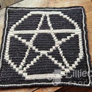 A crochet pattern using overlay mosaic crochet technique. The pattern has a dark background with a white pentagram motif in the middle. The watermark says Lilliecat crochet. It has an alternative and witchy feel.