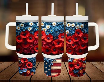 May include: Three white tumblers with a handle and a straw. Each tumbler has a different design. The first tumbler has a red, white, and blue floral design. The second tumbler has a red, white, and blue American flag design. The third tumbler has a red, white, and blue floral design.