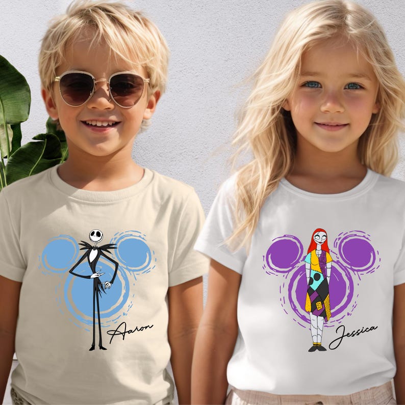 A boy and a girl wearing t-shirts with cartoon characters from the movie " Nightmare Before Christmas".