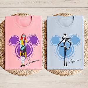 two t-shirts with cartoon characters from the movie " jack Skellington and Sally" printed on them.