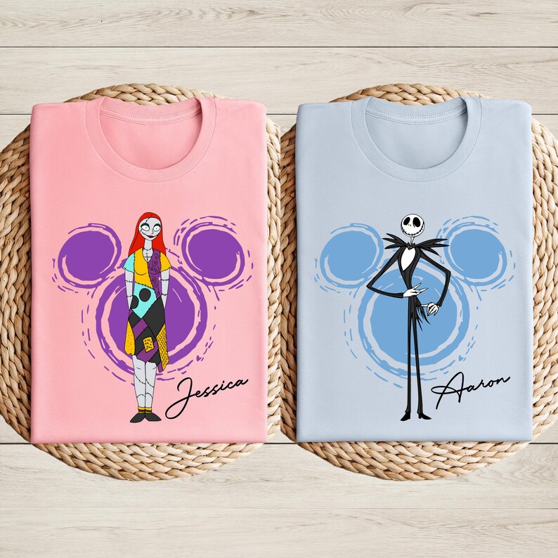 two t-shirts with cartoon characters from the movie " jack Skellington and Sally" printed on them.
