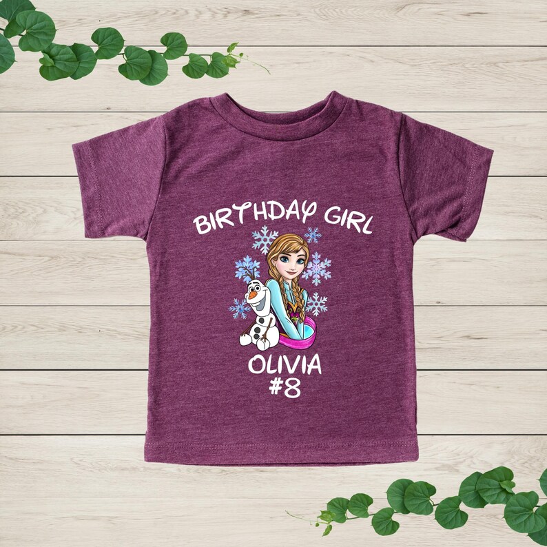 a purple birthday shirt with a frozen princess on it