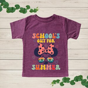 a purple shirt that says school's out for summer