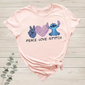 Camiseta "Peace Love Stitch", camiseta "Stitch y Lilo", camiseta "Disney", camiseta "Stitch y Angel", camiseta "Disneyworld Spring Break", camiseta "Disney Trip" imagen 1