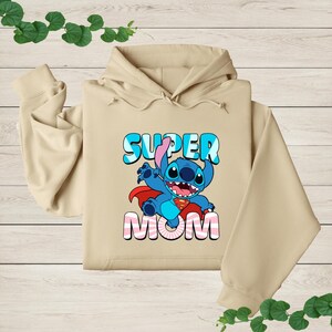 a hoodie with the words super mom printed on it
