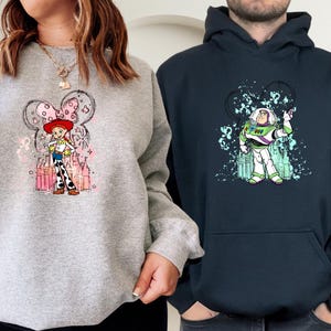 a couple of people standing next to each other