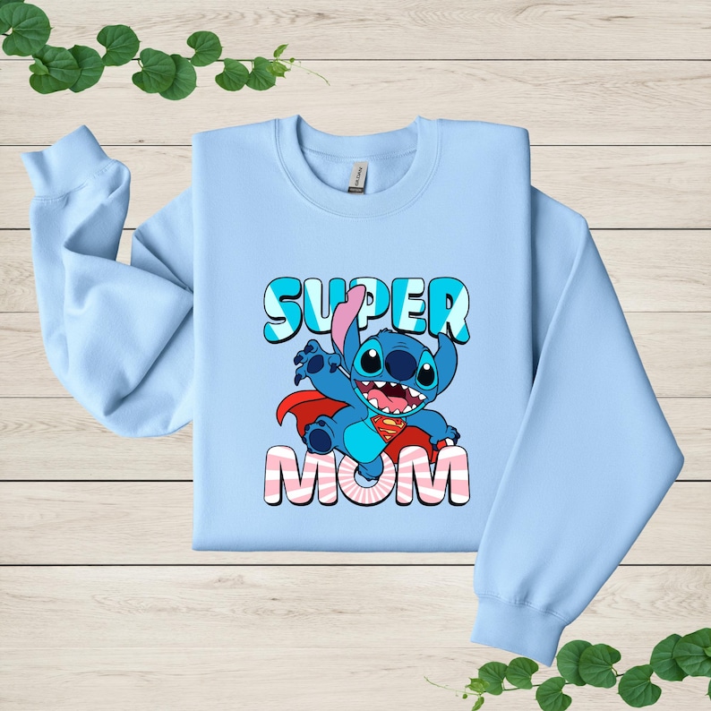 a blue sweatshirt with a cartoon character on it