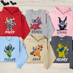 A collection of seven colorful hoodies featuring characters from the Disney movie "Stitch". The hoodies have unique designs and names, such as "DAVID", "JAMES", "EMMA", "TAYLOR", "NOAH", and "HENRY".
