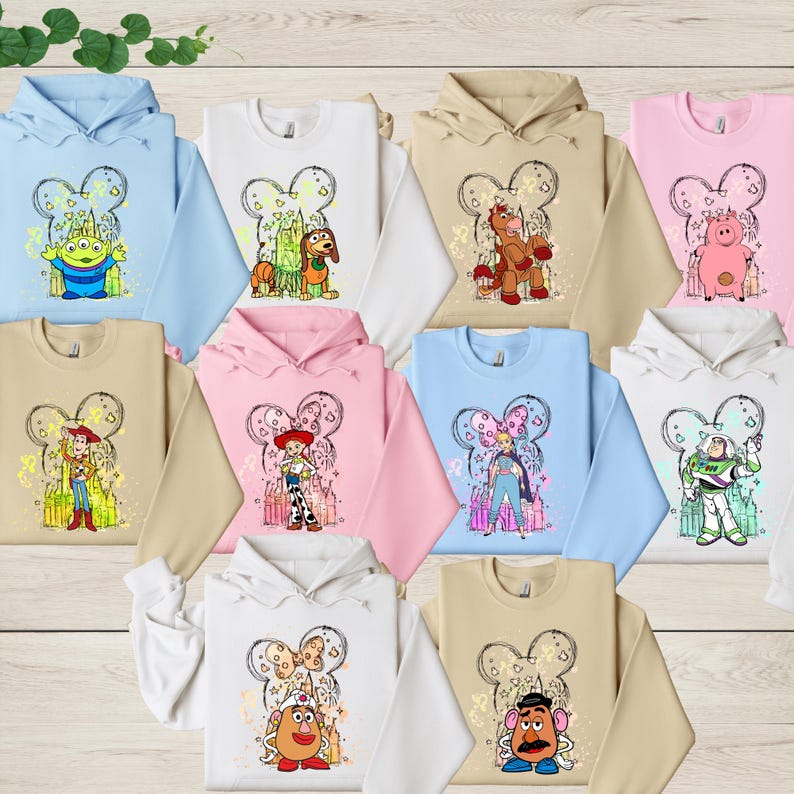 a group of children's hoodies with cartoon characters on them