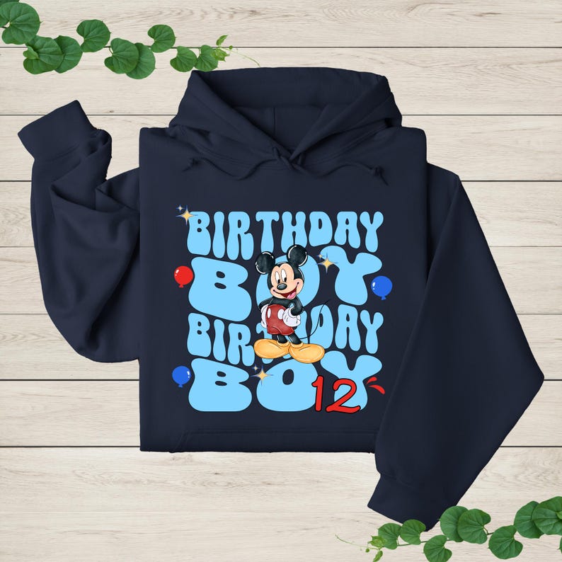 a hoodie with a mickey mouse design on it