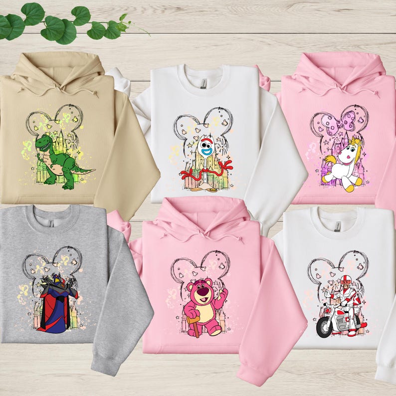 a group of children's hoodies with cartoon characters on them