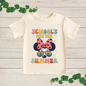 a t - shirt with a minnie mouse design on it