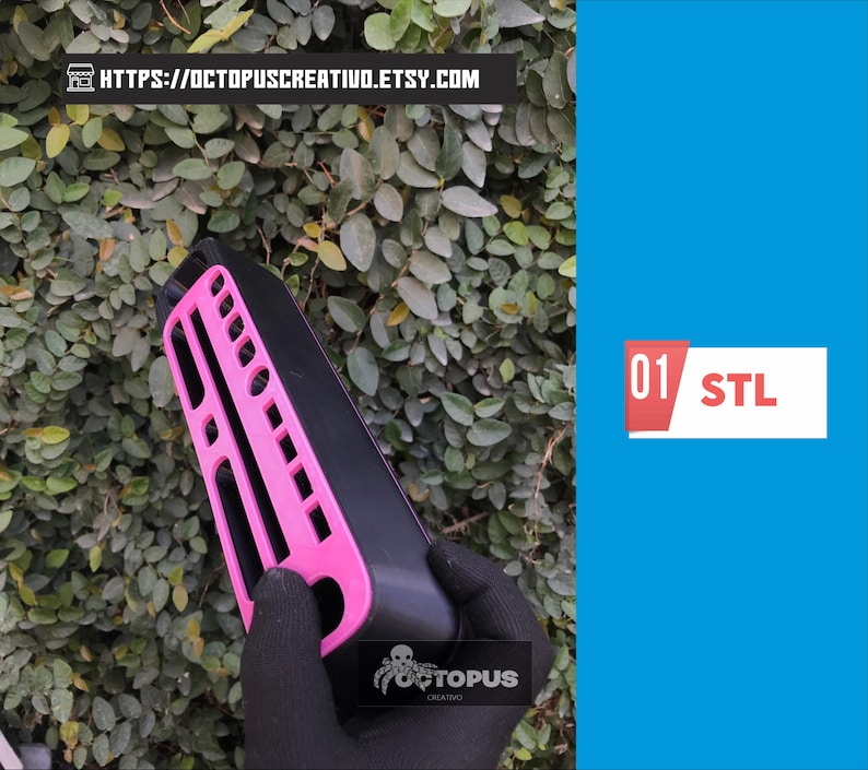 May include: A black and pink object with a grid-like design is held against a backdrop of green leaves. The object has a rectangular shape with a pink, open-grid design on one side. The text "01 STL" is on a white and red rectangle.