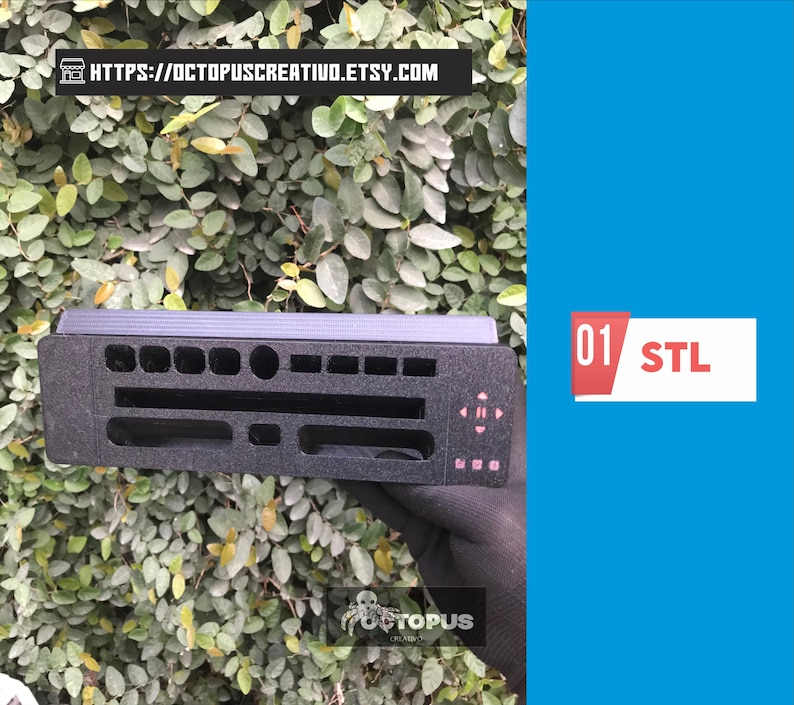 May include: A black, rectangular 3D-printed object with various cut-out shapes and a series of small, pink buttons. The object is held against a backdrop of green foliage and a bright blue background. The text "01 STL" is visible.