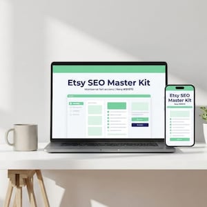 May include: A laptop and smartphone display the text "Etsy SEO Master Kit" in a teal and navy color scheme. A mug sits to the left of the laptop. The laptop and phone are on a white surface.
