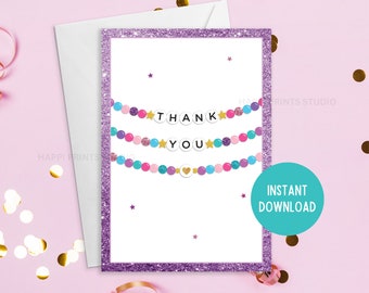 May include: A purple glitter card with a white background and a thank you banner made of colorful beads and gold stars. The text "Thank You" is written in black letters on the banner. The card also has the text "Instant Download" in a teal circle.