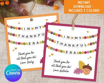 May include: Two square printable tags with the text "IN MY THANKFUL ERA". One tag has an orange border, the other a magenta border. Both have a string of colorful beads and stars, with the text "Thank you for all that you do! Love, Emily" and "Love, Natalie".