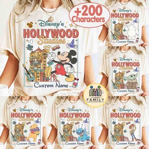 May include: Cream-coloured t-shirts featuring Disney's Hollywood Studios designs. The shirts showcase various characters like Mickey Mouse, Baymax, Grogu, Winnie the Pooh, Stitch, and Jessie. Each design includes the text "Disney's Hollywood Studios" and "Custom Name".