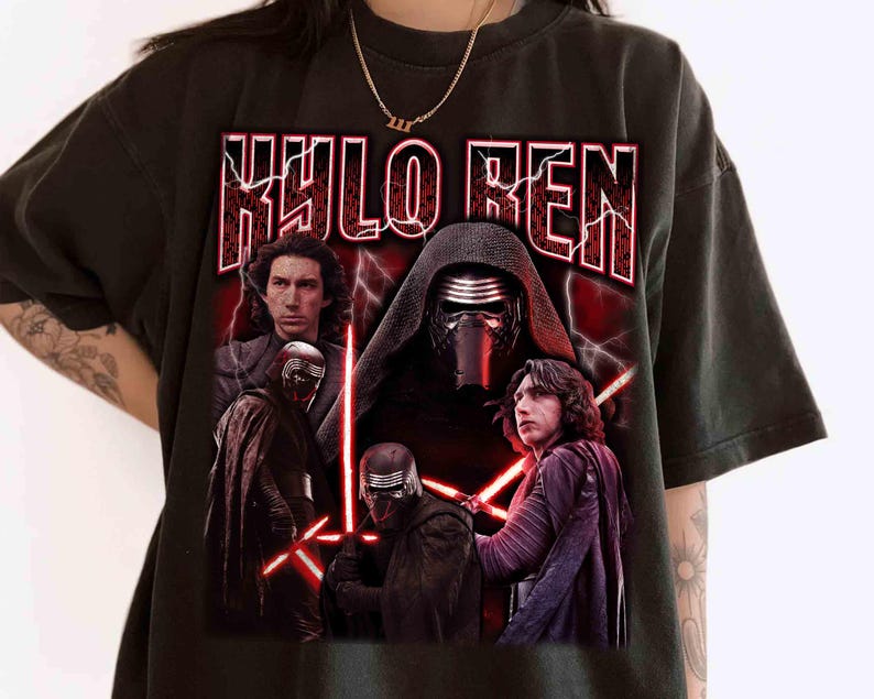 May include: Black t-shirt with a graphic of Kylo Ren from Star Wars. The design includes multiple images of the character, the name "KYLO REN" in red, and red lightning bolt accents. The shirt has a vintage, distressed appearance.