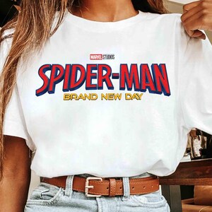 May include: A set of three ceramic mugs with a speckled, matte finish. The mugs are in shades of cream, light gray, and dark gray. Each mug has a simple, minimalist design, perfect for coffee or tea.