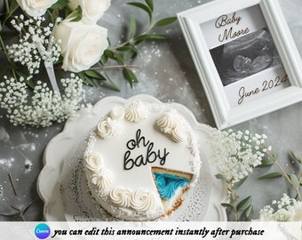 May include: A white cake with blue frosting inside, decorated with white frosting rosettes and the words "oh baby" in black script. The cake is on a white plate with a lace pattern. A white frame with a sonogram image and the text "Baby Moore June 2024" is in the background.