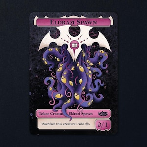 May include: A rectangular trading card titled Eldrazi Spawn featuring a central purple creature with multiple tentacles and yellow eyes. The card has a black background, a pink header and footer, and text that reads Sacrifice this creature: Add.
