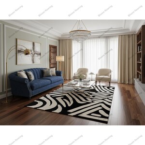 Scandinavian hand-tufted wool rug in black and white geometric pattern, plush minimalist decor for open space living room.