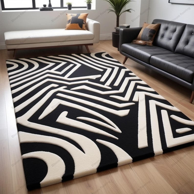 Scandinavian hand-tufted wool rug in black and white geometric pattern, plush minimalist decor for open space living room.