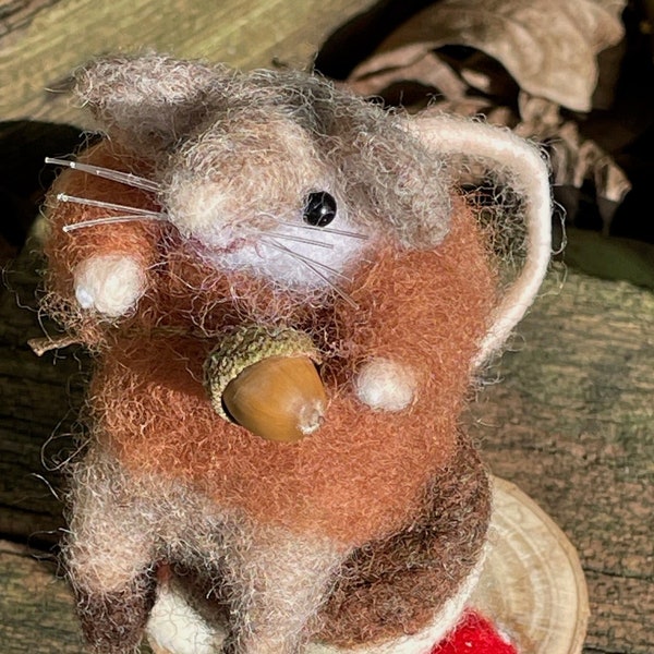 Cute and cosy needle felted Acorn mouse on a toadstool