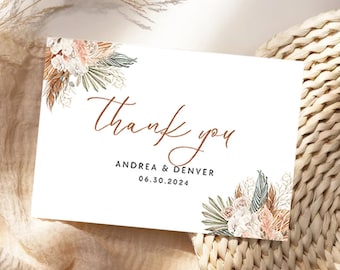 May include: A white thank you card with a brown floral design and the text "thank you" in brown script. The card also includes the names "Andrea & Denver" and the date "06.30.2024" in brown text.