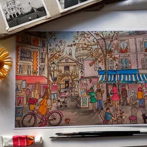 Puede incluir: Una pintura de acuarela de una escena callejera parisina con un caf&eacute;, artistas y una iglesia en el fondo. La pintura est&aacute; hecha en un estilo caprichoso con colores brillantes y l&iacute;neas audaces.