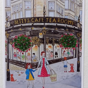 May include: Watercolor illustration of Betty's Cafe Tea Rooms with people and a dog on a sidewalk. A woman and child walk in front of the cafe, holding hands. The cafe has a black awning with the cafe's name in gold lettering.